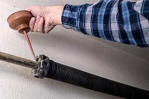 Garage Door Spring Repair Brookline